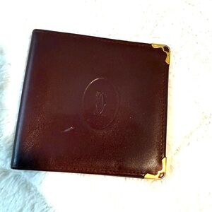 Cartier Elegant Burgandy Leather Wallet with Gold Accents